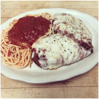 Chicken parmesan with a side of spaghetti